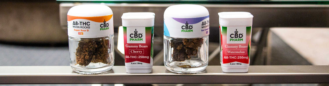 Wholesale CBD Pharm Gummies and CBD Pharm Moon Rocks standing on office chair in normal lighting